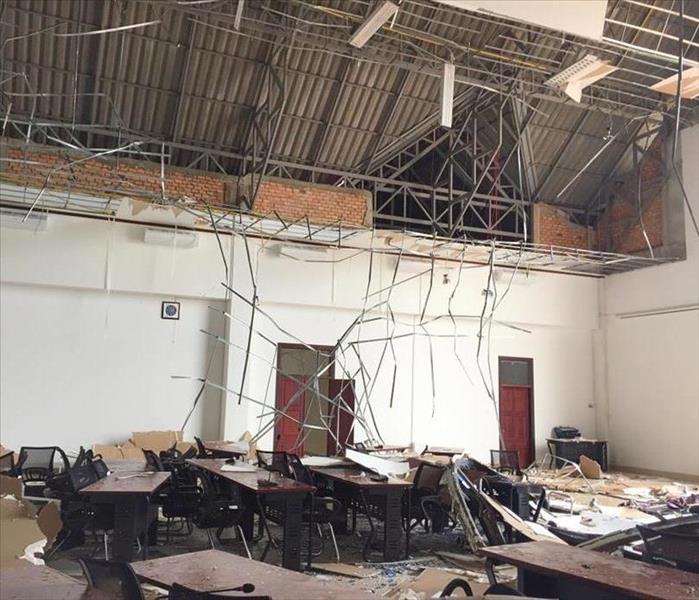 Damage to the roof and ceiling of an office following a violent storm in Vientiane, Laos.